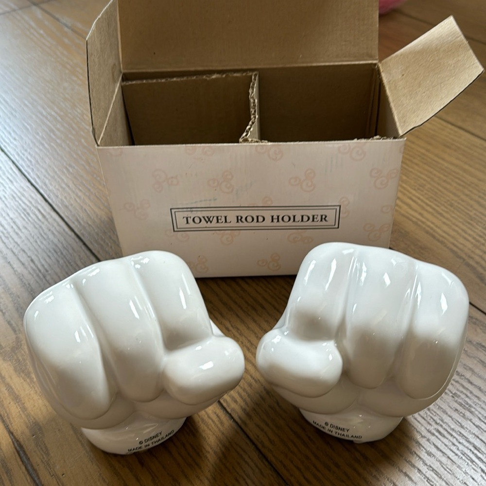 New In Box Disney Towel Rod Holder.